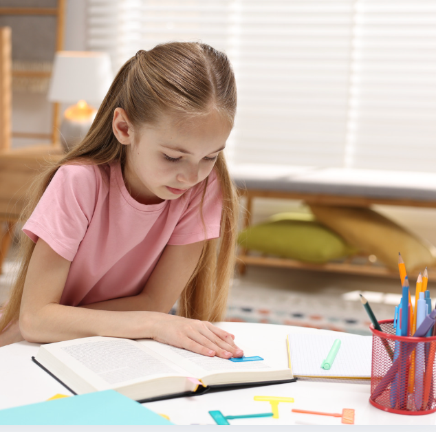 Tutor working one-on-one with a student in a warm learning environment